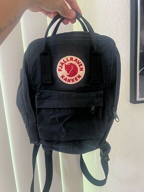 Fjallraven Kanken Mini Backpack in Black with Red Logo